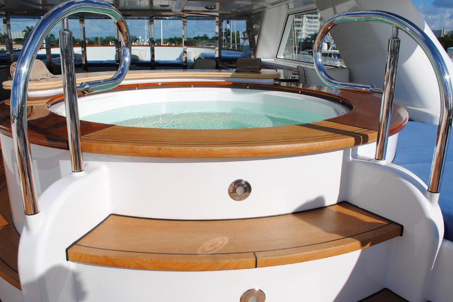 A hot tub on the deck of a boat.